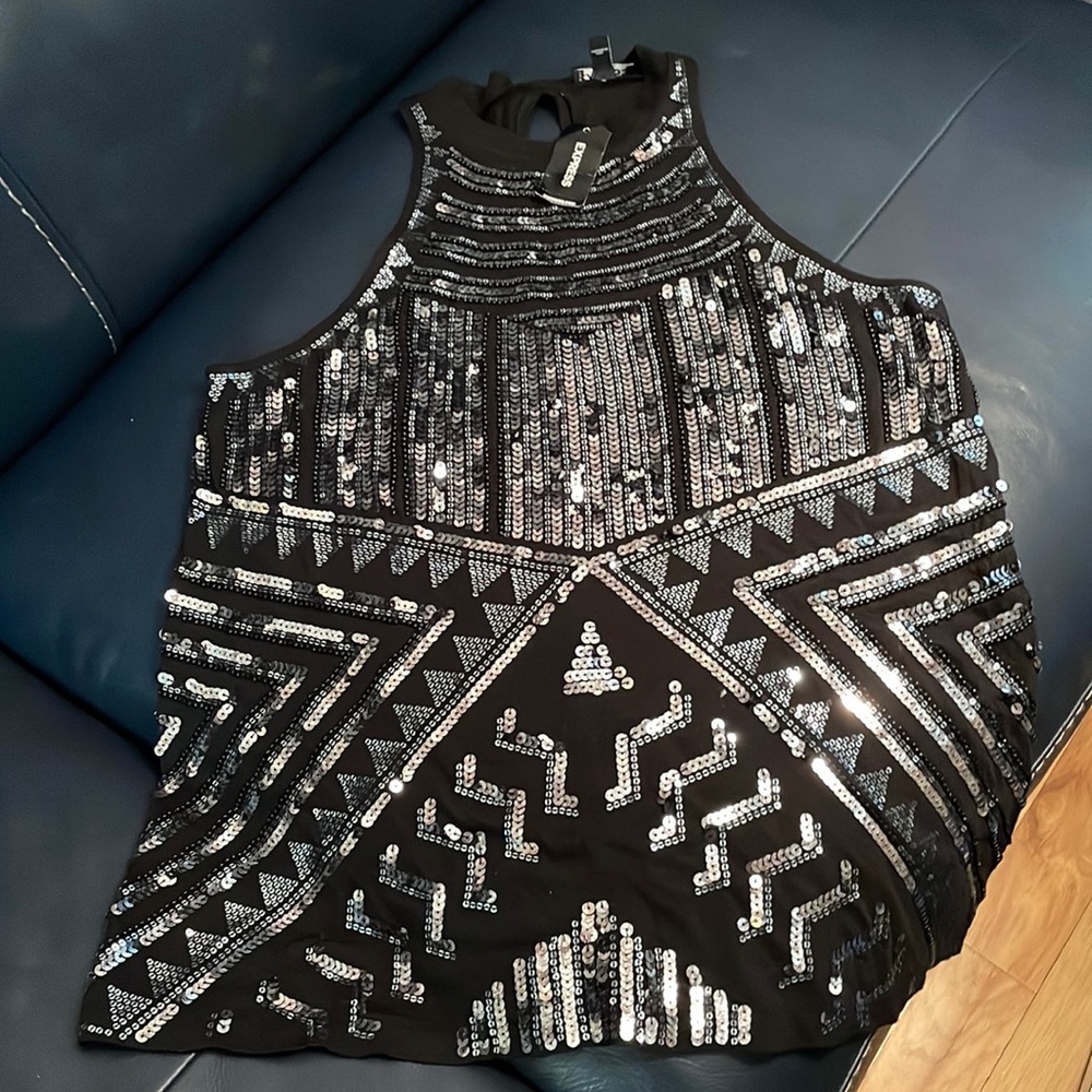 Black w/silver sequin top, looks with white jeans or shorts